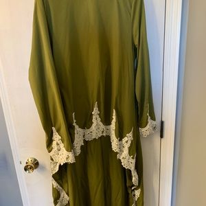 Green and white blouse longer from back